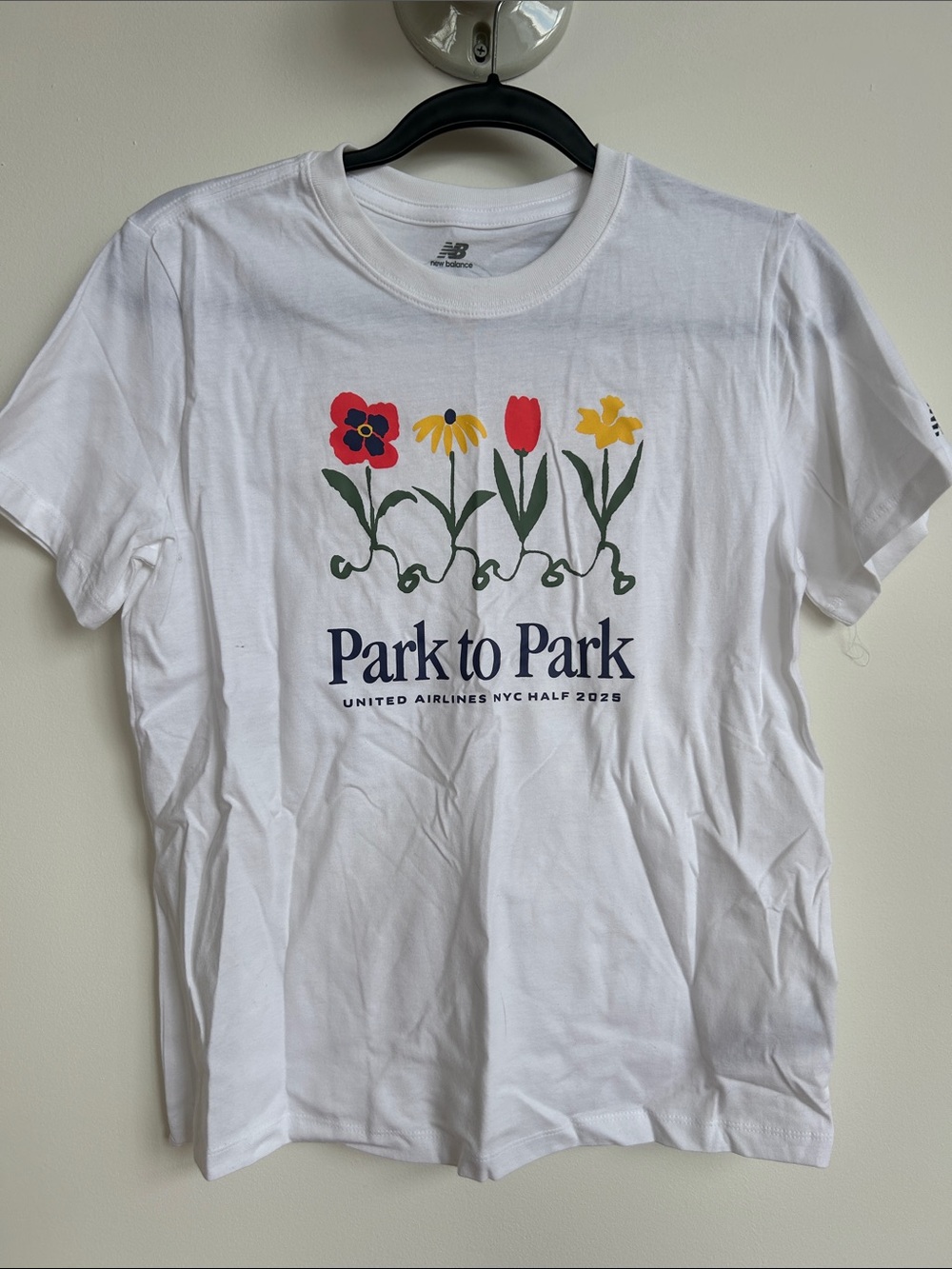 New Balance 2025 NYRR "Park to Park" White Floral Graphic Tee